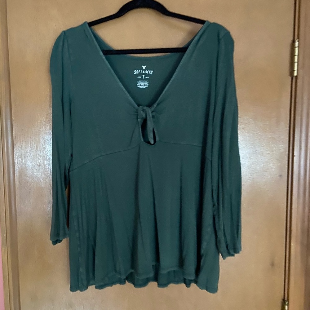 A long sleeve top with a key-hole tie neck line!